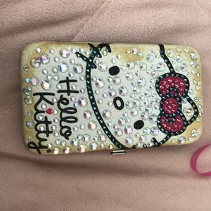 Hello kitty phone/ wallet.